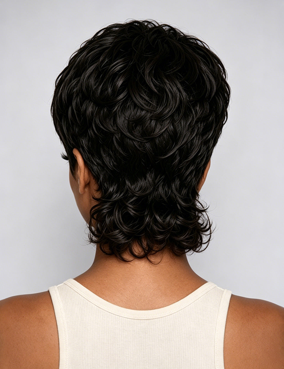 Short, layered wavy wig shown from the back on a model wearing a cream ribbed tank top, against a light gray background.