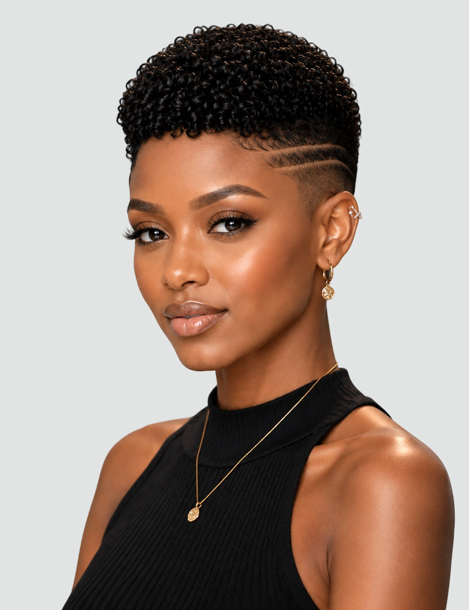 Front_view_of_black_afro_curly_pixie_wig_with_fade_and_hard_part_design.jpg