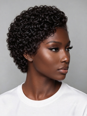 A woman with a short, tightly curled black wig or hairpiece shown in profile against a plain light gray background. The product appears to be the hair itself rather than a styling result, so the hair color and texture are the product colors.