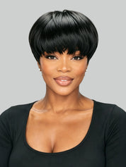 A woman with a high, voluminous black ponytail wig wearing a white ribbed V-neck top, shown in a three-quarter profile against a solid light gray background.