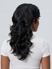 A close-up of the back of this long, curly wolf head wig showcases its unique layering and voluminous wavy texture. The hair cascades down like a waterfall, creating a layered, voluminous effect that highlights the dynamism and density of the black human hair.