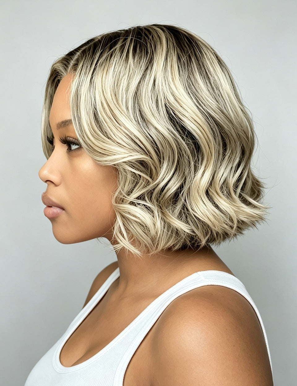 Side view of 10 inch highlight human hair bob wig black and blonde