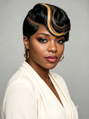 A woman with a styled black wig featuring dramatic golden-brown highlights, wearing a cream draped top and gold hoop earrings against a neutral gray background.