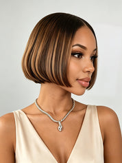 Side profile close-up showing the short tapered side and wispy bangs of the brown bob topper. The dimensional color and sleek styling frame the face perfectly, demonstrating the versatility of this glueless human hair piece.