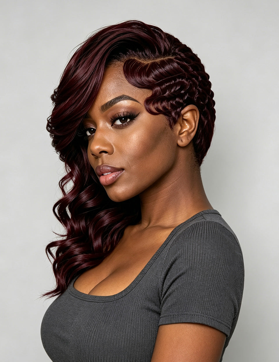 Black woman wearing a claret red 13x4 lace front wig with a side part and big wave texture. The long human hair wig is styled glueless for a natural hairline