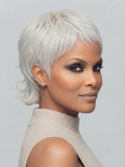 Three-quarter angle shot of a stylish silver grey pixie wig showing depth and dimension. The layered cut adds volume to the top while keeping the sides sleek, highlighting the shiny texture of the human hair.