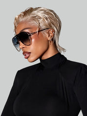 Three-quarter profile of the glueless pixie wig in golden blonde. Highlights the layered cut and the realistic scalp appearance of the 13x4 Swiss lace front.