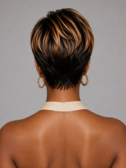 Back view of a short stacked pixie wig showing the tapered nape and dimensional color layers. Perfect for a low-maintenance protective style.
