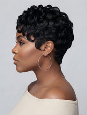 Side profile of a woman wearing a black full lace pixie wig with defined pin curls on top. The short human hair wig features a tapered nape and natural sideburns, showcasing a chic retro look.