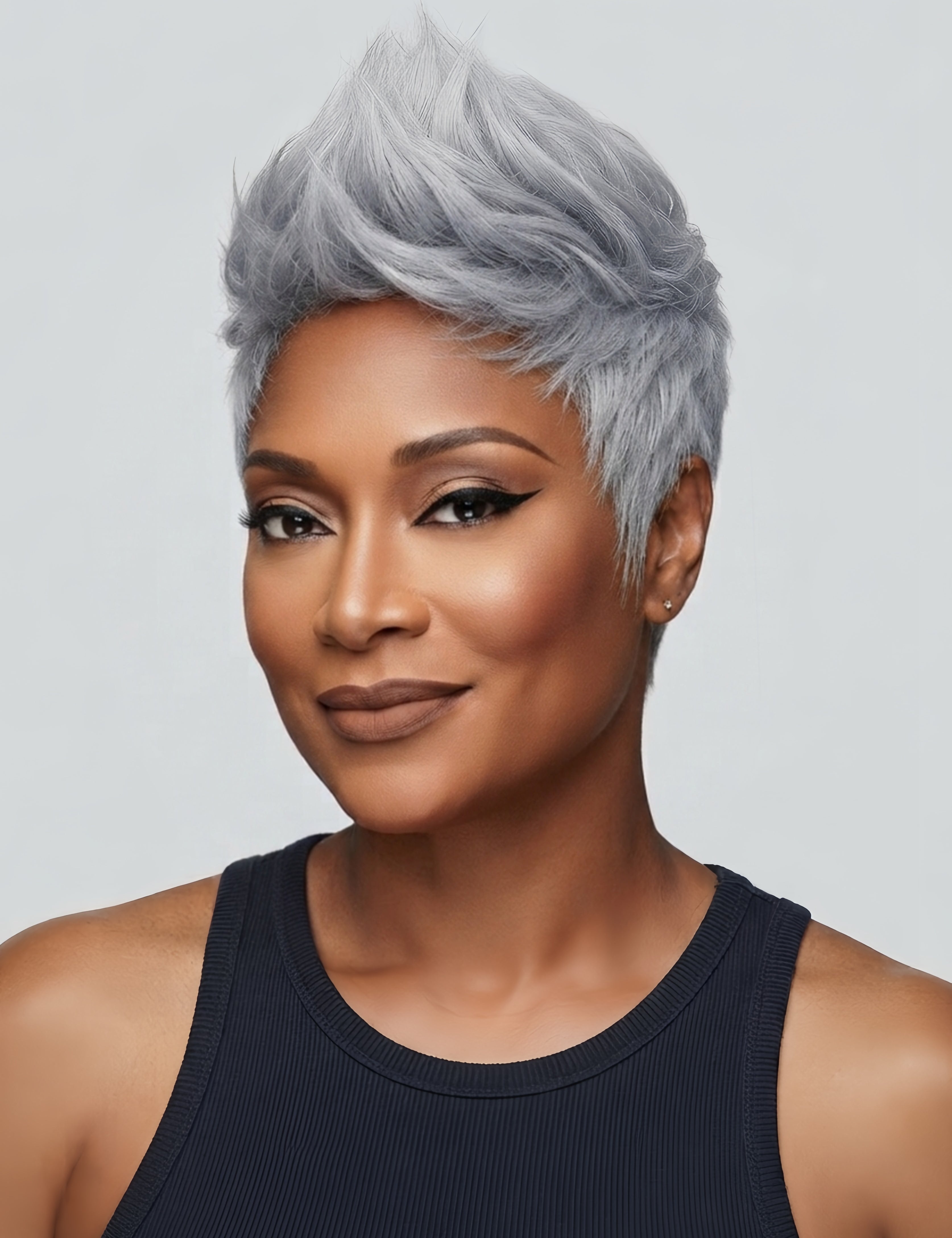 Smiling model wearing a chic salt and pepper pixie cut wig with a natural parting. The straight human hair wig offers a mature yet trendy look, suitable for daily wear or special occasions.