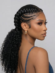 Right side profile of a woman in a half-up braided style wig, revealing the detailed knotless braiding technique along the temple. The long, dark curly hair flows over her shoulder, emphasizing the seamless blend between the braided crown and the loose curls.
