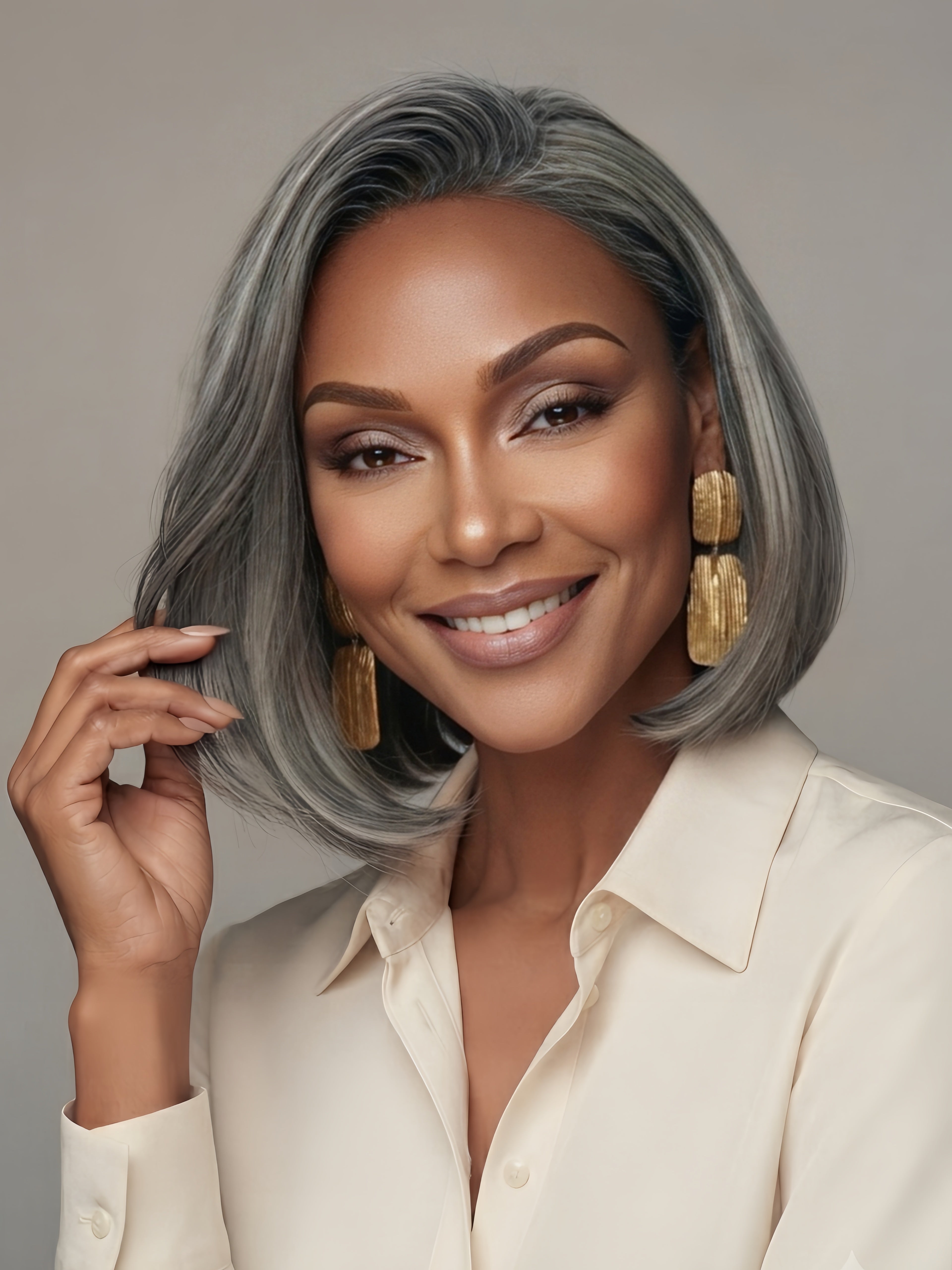 Close-up angled shot emphasizing the glossy texture and natural parting of the salt and pepper bob wig. The detailed view demonstrates the high-quality definition of each strand, offering a chic and low-maintenance hairstyle option for mature women.