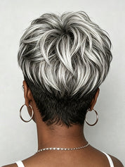Back view of a short layered hair topper featuring a trendy salt-and-pepper grey highlight mix. The tapered nape cut blends naturally with bio hair, showcasing the realistic texture and volume of the pixie style."