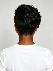 Back view revealing the tapered nape cut and smooth layering of the short wig topper. The clean finish at the neckline demonstrates the precise craftsmanship and natural fall of the human hair.
