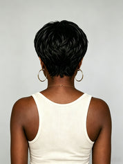 Back view showcasing the clean taper and natural fall of the black short wig. The smooth texture and precise cut at the nape highlight the wig’s realistic construction and easy maintenance for glueless wear.