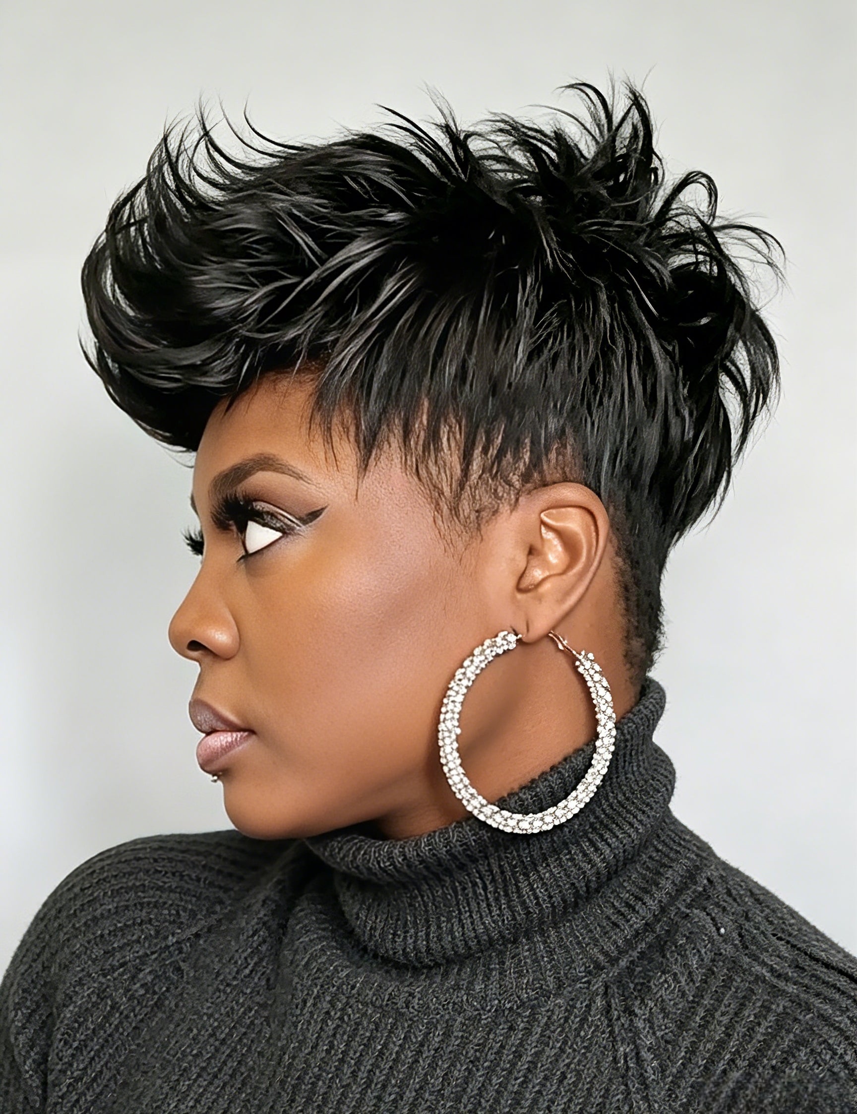 Back view showcasing the clean taper and natural fall of the black short wig. The smooth texture and precise cut at the nape highlight the wig’s realistic construction and easy maintenance for glueless wear.