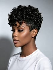 A woman with a short, curly black wig or hairpiece shown in profile against a light gray studio background. The hair is the apparent product, with the white T-shirt excluded from product color decisions.